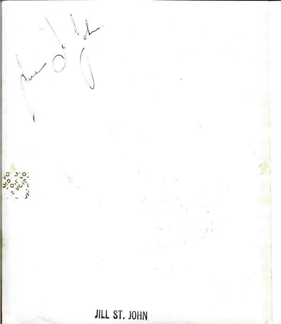 Jill St. John. A very early signed (to back) 10x8: Jill St. John. A very early signed (to back) 10x8 vintage 'Universal Pictures' 1957 photo. The actress signed for the studio in May 1957 when she was 16. Remembered for playing 'Tiffany Case' in the J