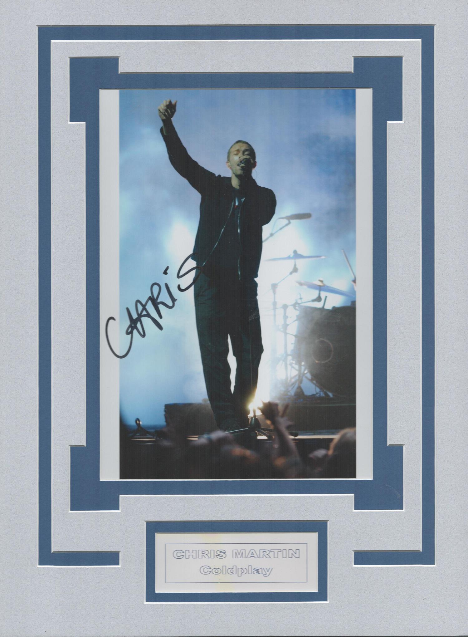 Chris Martin from Coldplay signature piece autograph: Chris Martin from Coldplay signature piece autograph presentation. Mounted with unsigned photo to approx. 16 x 12 inches overall. Good condition. All autographs come with a Certificate of Authenticity