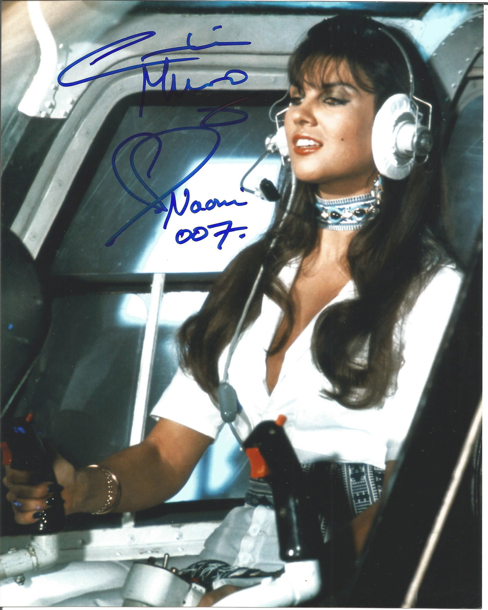 Caroline Munro Handsigned 10x8 Colour photo. Photo: Caroline Munro Handsigned 10x8 Colour photo. Photo shows Munro in a Helicopter Scene during Bond Film The Spy Who Loved Me playing the Charater Niomi. Good condition. All autographs come with a Certif