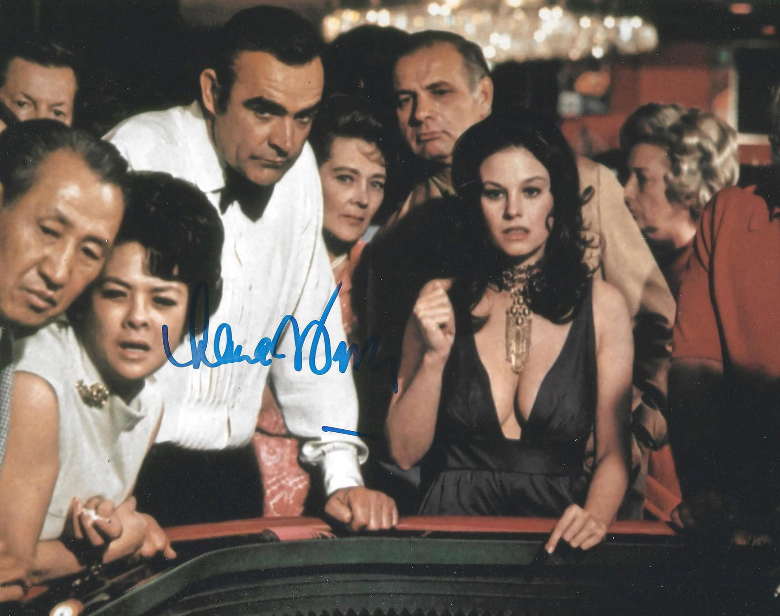 Bond Girl, Lana Wood signed 10x8 movie scene photograph. Wood is well know from her role as Plenty: Bond Girl, Lana Wood signed 10x8 movie scene photograph. Wood is well know from her role as Plenty O'Toole in the James Bond film Diamonds Are Forever. Good condition Est.