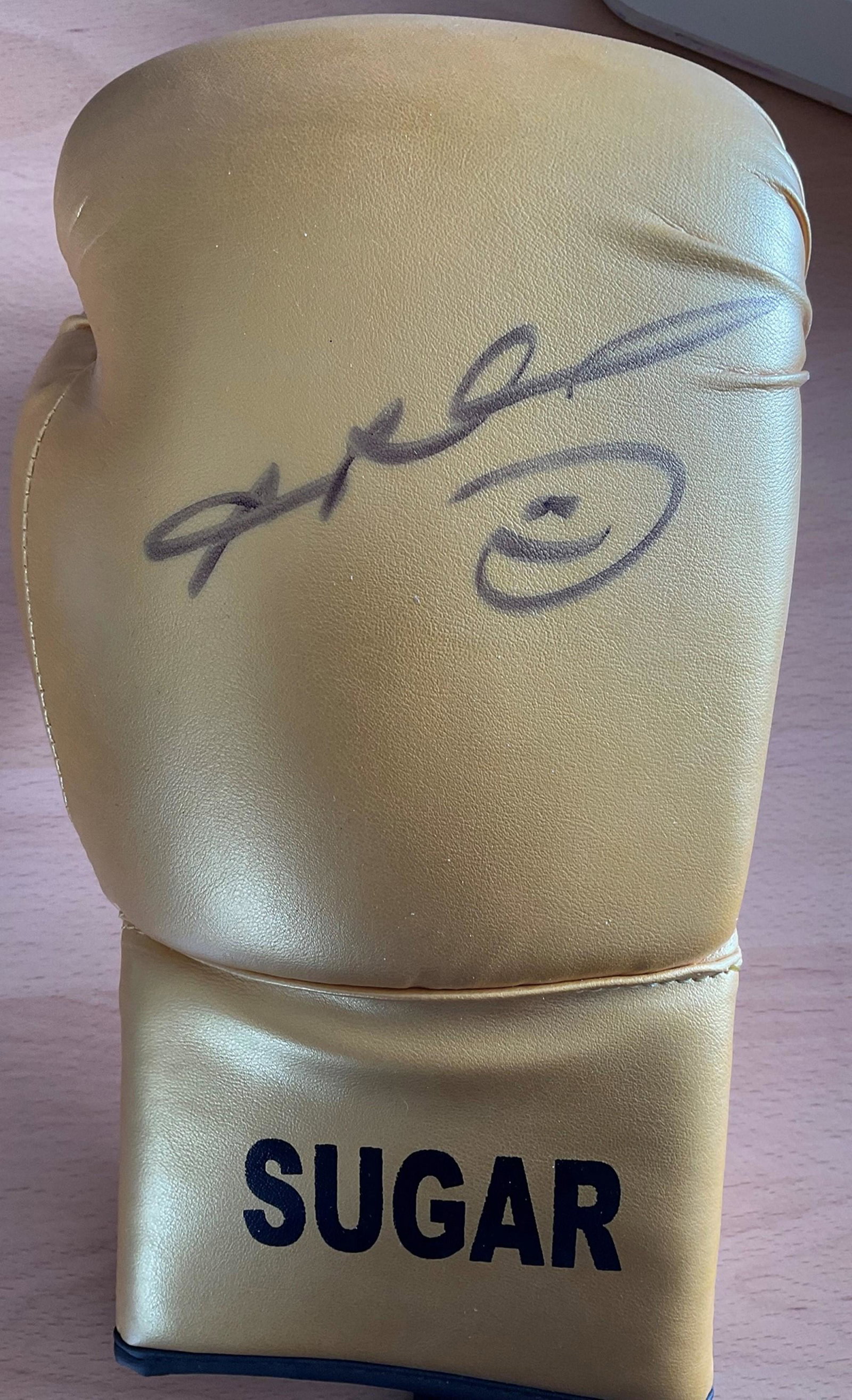 Sugar Ray Leonard signed Golden Sugar Boxing Glove fantastic item from one of all-time great of: Sugar Ray Leonard signed Golden Sugar Boxing Glove fantastic item from one of all-time great of boxing Ray Charles Leonard (born May 17, 1956), best known as Sugar Ray Leonard, is an American former p