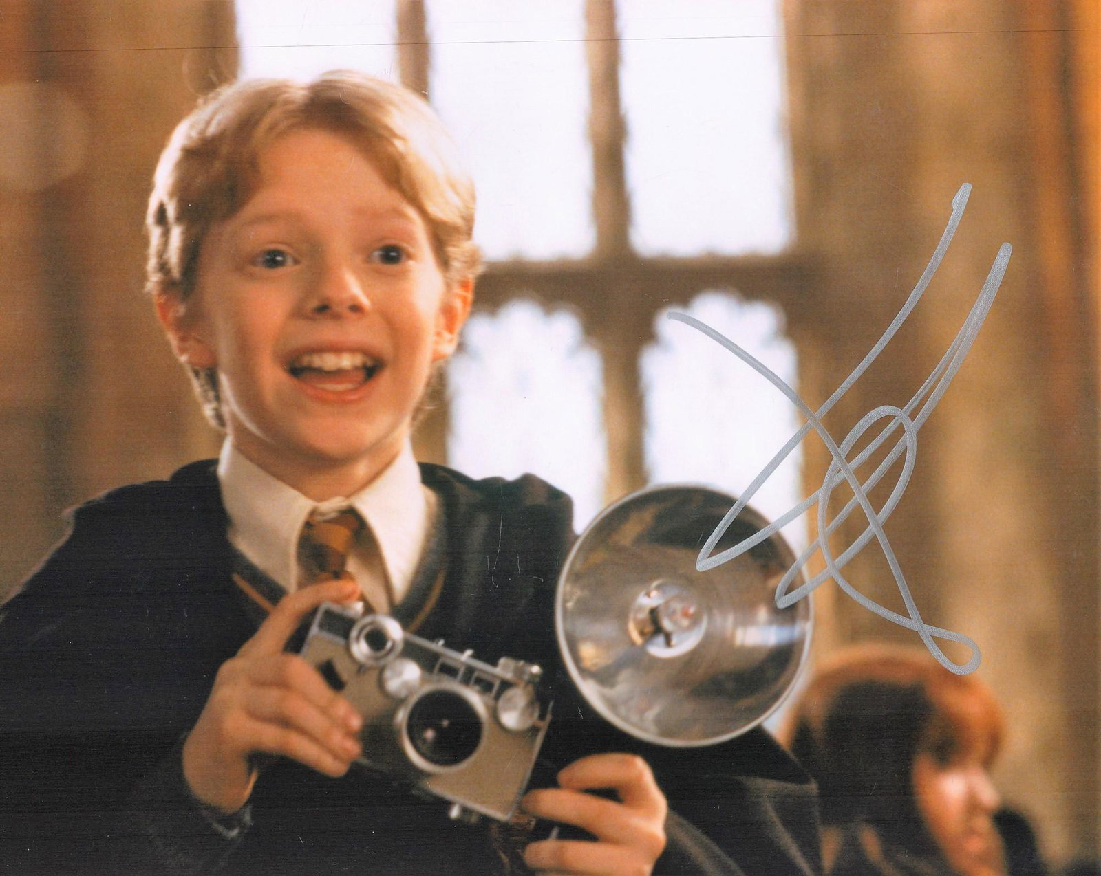 Hugh Mitchell Signed 10x8 Colour Photograph Pictured During His Role as Colin Creevey in Harry: Hugh Mitchell Signed 10x8 Colour Photograph Pictured During His Role as Colin Creevey in Harry Potter and The Chamber Of Secrets. Good condition. All autographs come with a Certificate of Authenticity