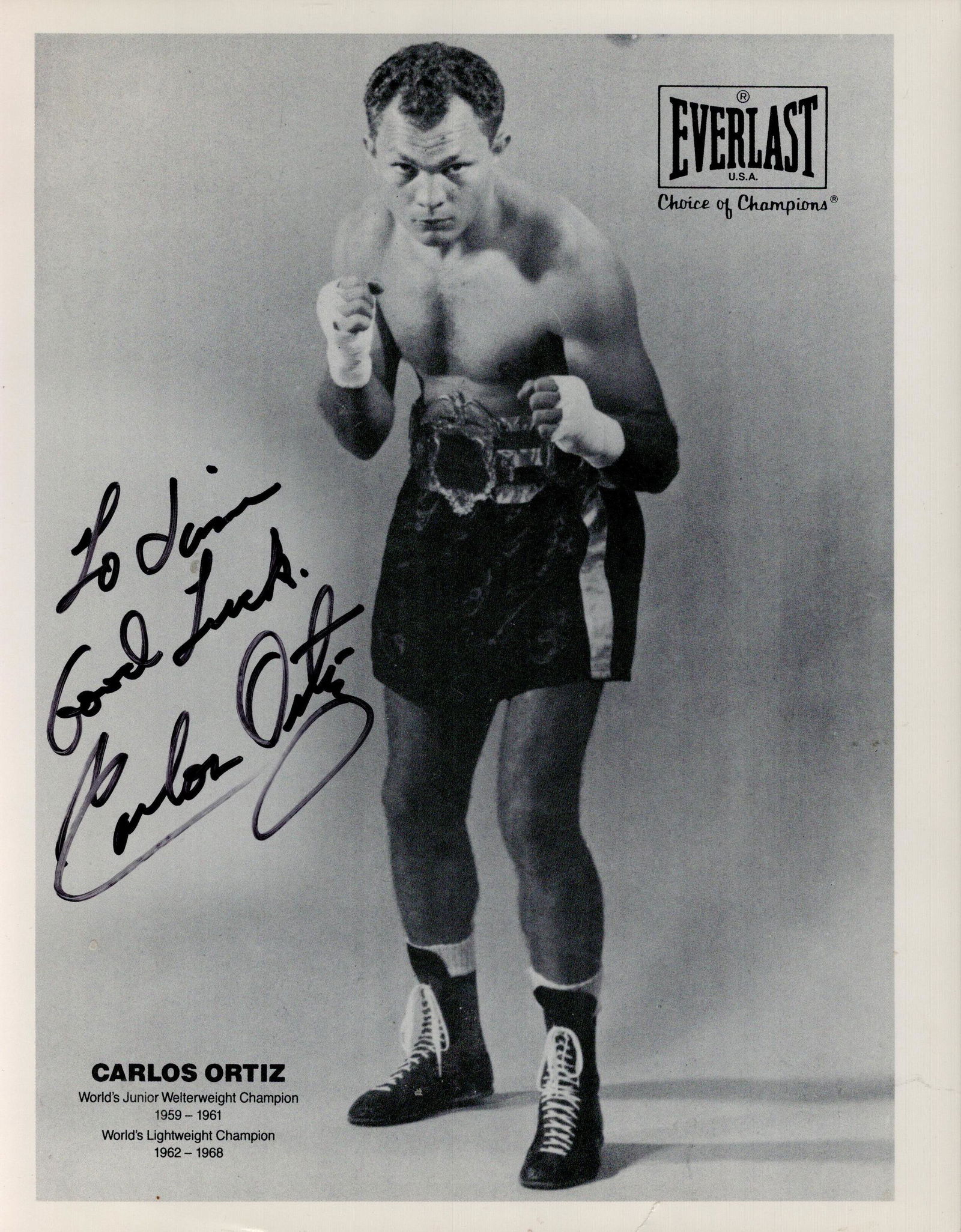 Carlos Ortiz signed Everlast 10x8 vintage black and white promo photo. Dedicated. Good condition.: Carlos Ortiz signed Everlast 10x8 vintage black and white promo photo. Dedicated. Good condition. All autographs come with a Certificate of Authenticity. We combine postage on multiple winning lots an