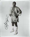 Joe Frazier signed 10x8 inches black and white vintage photo. Good condition Est.