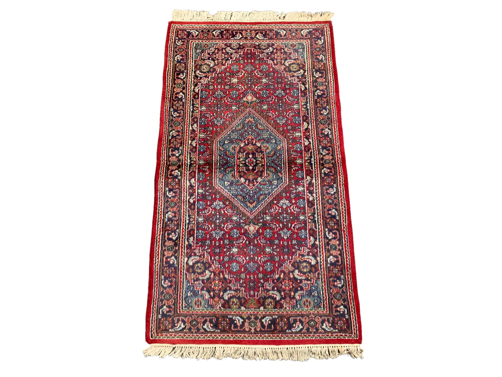 3X6 Estate Bidjar, Circa 1980: Hand-knotted wool pile on a cotton foundation. Circa 1980 Dimensions: 2'11" x 5'7" Origin: India Condition: Good for its age Field Color: Red Border Colors: Navy-Blue Accent Colors: Ivory, Light-Blue 