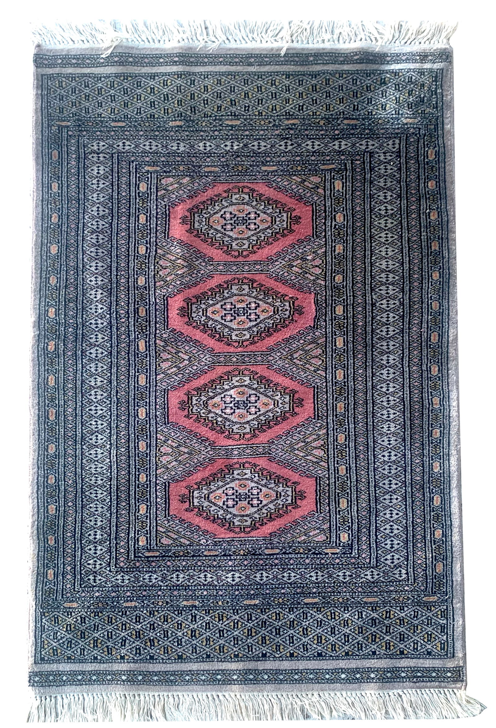 3X4 Estate Pak Bukhara Rug, Circa 1990: Hand-knotted wool pile on a cotton foundation. Circa 1990 Dimensions: 2'8" x 3'11" Origin: Pakistan Condition: Excellent for its age Field Color: Rose Border Color: Ivory Accent Colors: Black, Gold