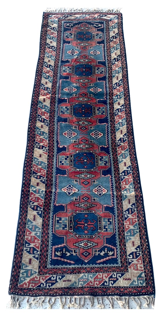 3X8 Estate Antique Caucasus Kazak Runner, Circa 1930: Hand-knotted wool pile on a cotton foundation. Circa 1930 Dimensions: 2'6" x 8'5" Origin: Caucasus Condition: Excellent for its age Field Color: Light-Blue Border Color: Ivory Accent Colors: Navy, Red