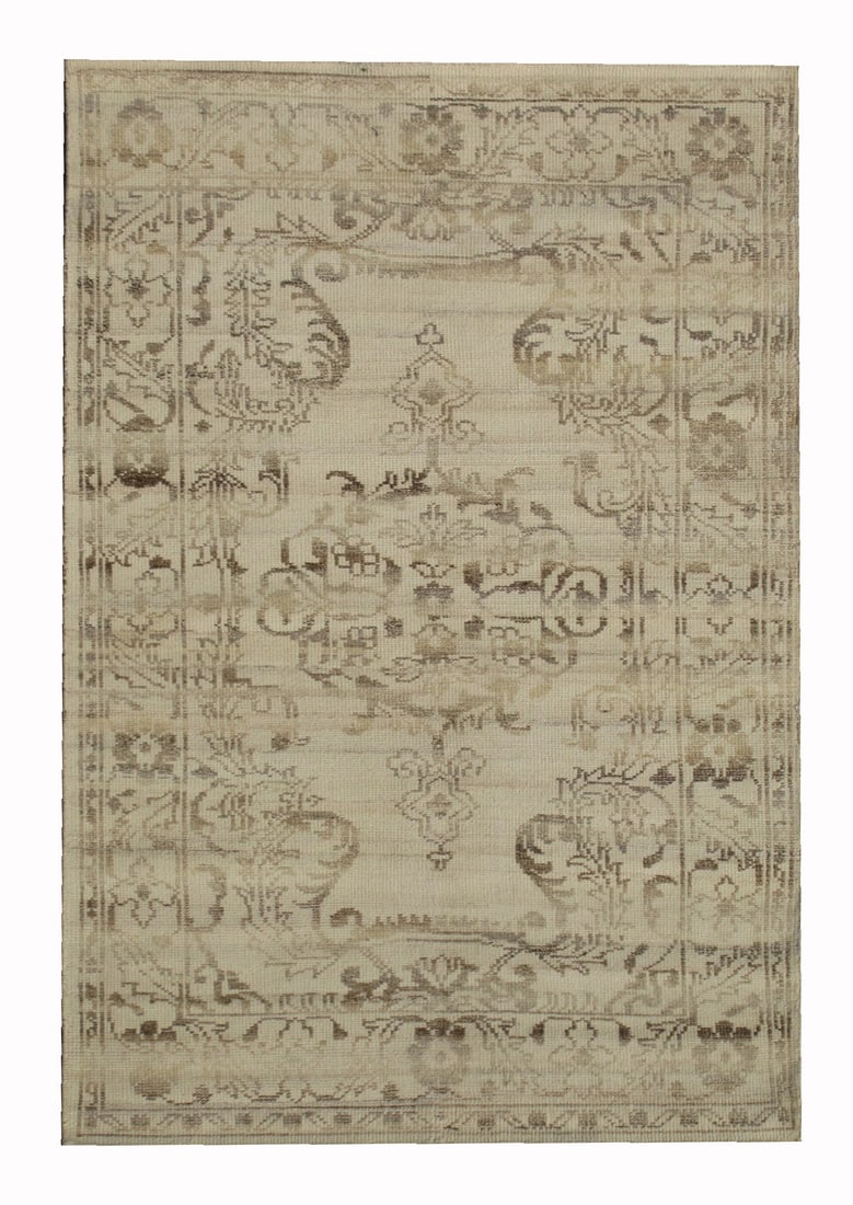 5X8 Antiqued Distressed Zero Pile Oushak: 4'10" x 7'5" Zero-pile, hand-knotted wool on a cotton foundation. New Origin: India Field Color: Beige Border Color: Beige Accent Color: Brown SKU: 80.44-03.24.21-5X8-AK085