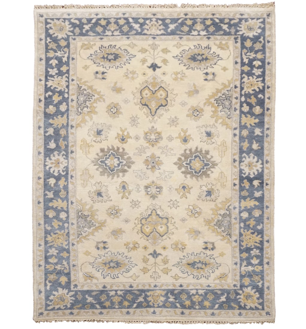 6X8 Beige Oushak Rug: Hand-knotted, vegetable dyed wool pile on a cotton foundation. Dimensions: 5'8" x 8'2" New Origin: India Field Color: Beige Border Color: Navy-Blue Accent Colors: Gold, Camel, Gray SKU: 60.166-02.23.1