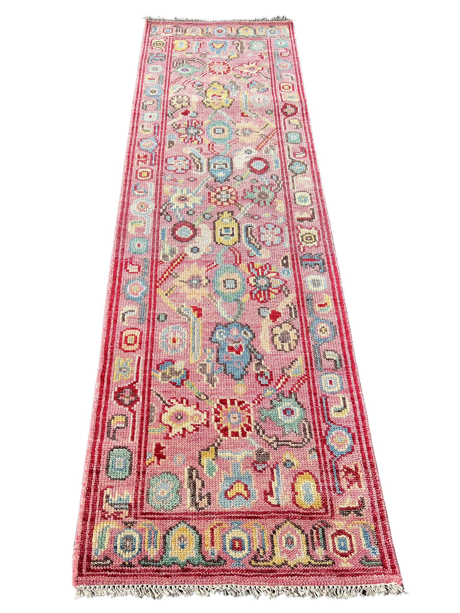 3X16 Pink Oushak Hand-Knotted Wool Rug (2'6" x 16'): Hand-knotted, wool pile on a cotton foundation. Dimensions: 2'6" x 16' Origin: India Field Color: Pink Border Color: Pink Accent Colors: Blue, Ivory, Brown, Red, Green SKU: 103F.22-09.28.23-3X16-26-AP