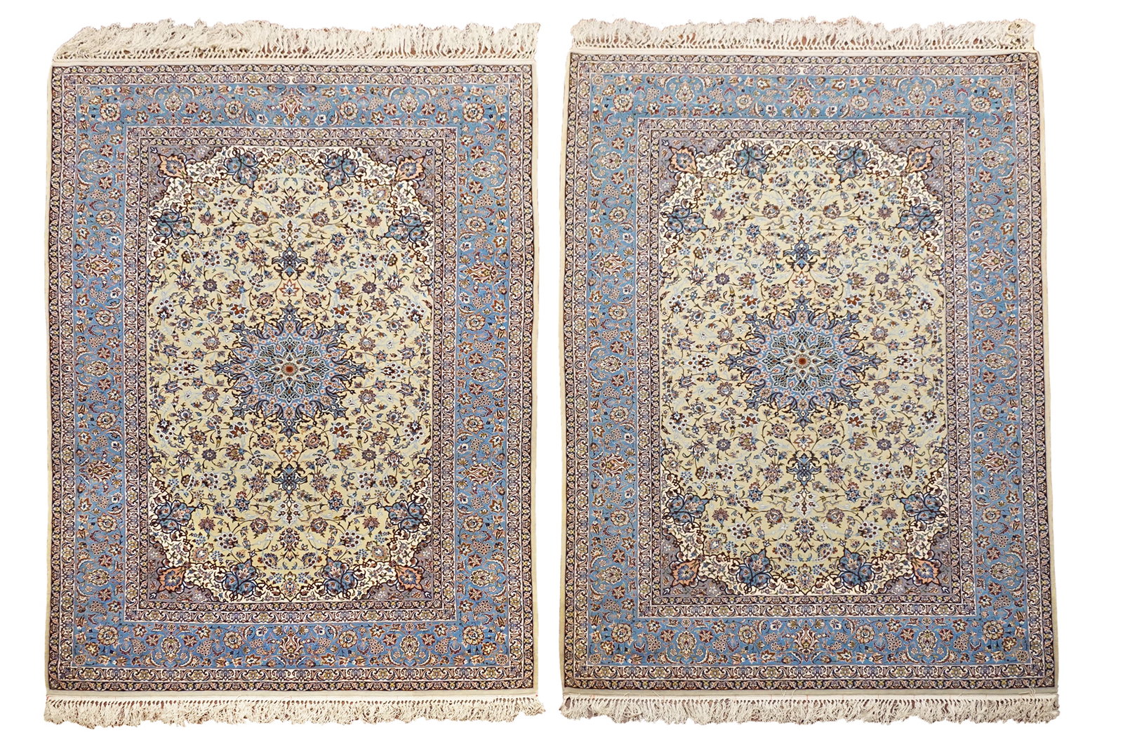 5X8 Pair of Vintage Wool and Silk Persian Isfahan Rugs, circa 1970: Hand-knotted wool & silk pile on a cotton foundation. Circa 1970 Dimensions: 5' x 8' (Each) Origin: Iran Condition: Excellent Field Color: Pale-Green Border Color: Blue Accent Colors: Navy-Blue, Ivory