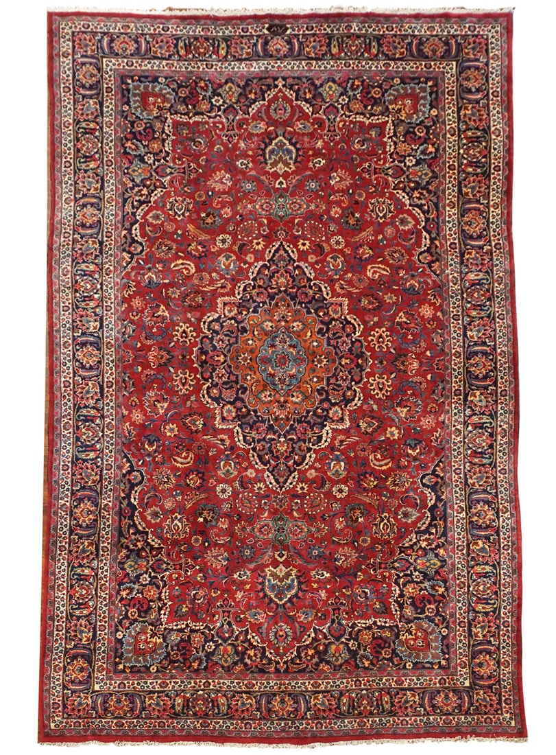10X16 Signed Burgundy Persian Mashad Rug, circa 1900: Hand-knotted wool pile on a cotton foundation. Signed by weaver, circa 1900 Dimensions: 9'10" x 16'1" Origin: Iran Condition: Excellent Field Color: Burgundy Border Color: Navy-Blue Accent Colors: Ivo