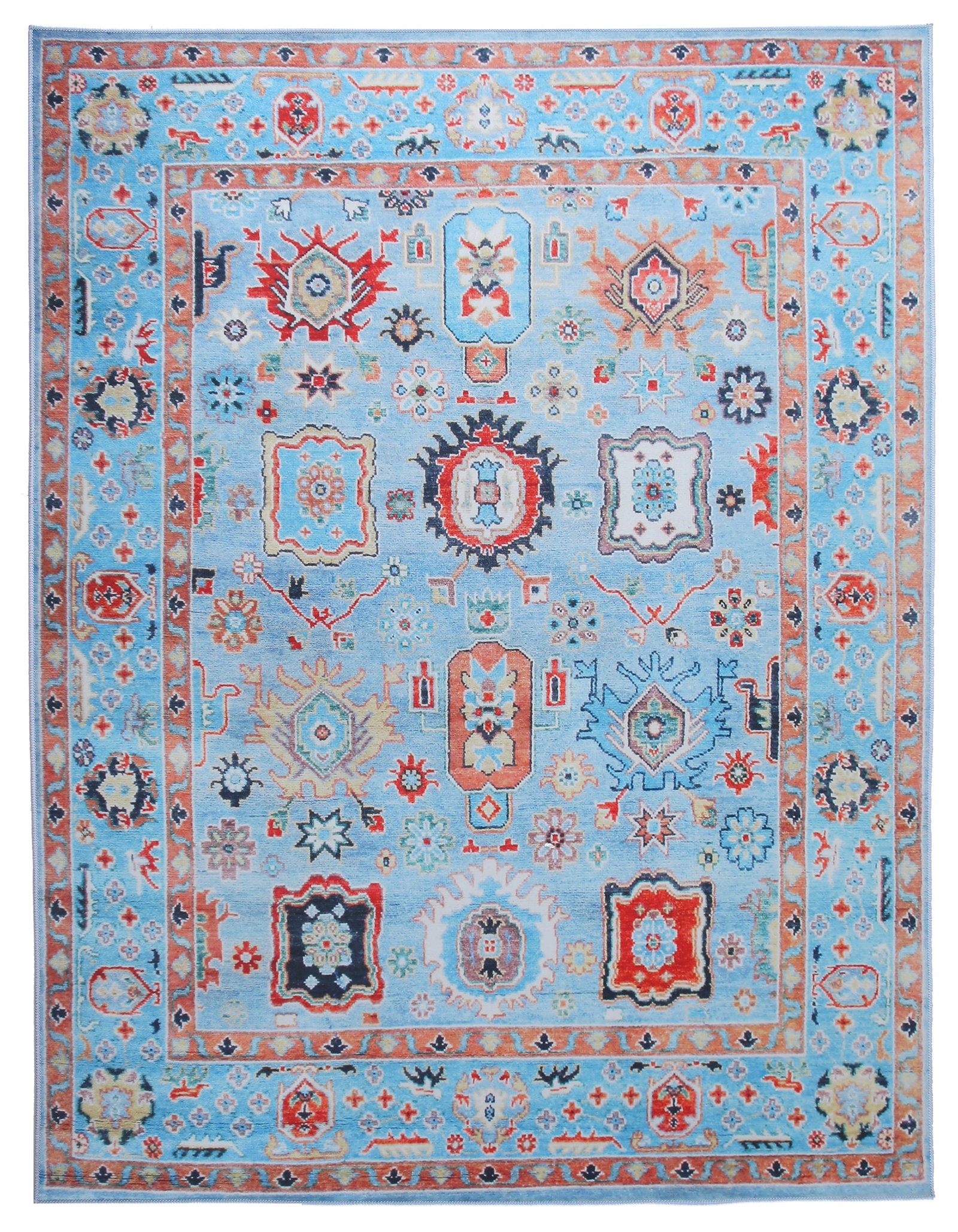 6X9 Modern Blue Oushak Machine Washable Area Rug: Machine Washable Approximate Dimensions: 6' x 9' Origin: China Field Color: Blue Accent Colors: Red, Navy, Ivory SKU: 96.56-01.16.23-6X9-10-AN187