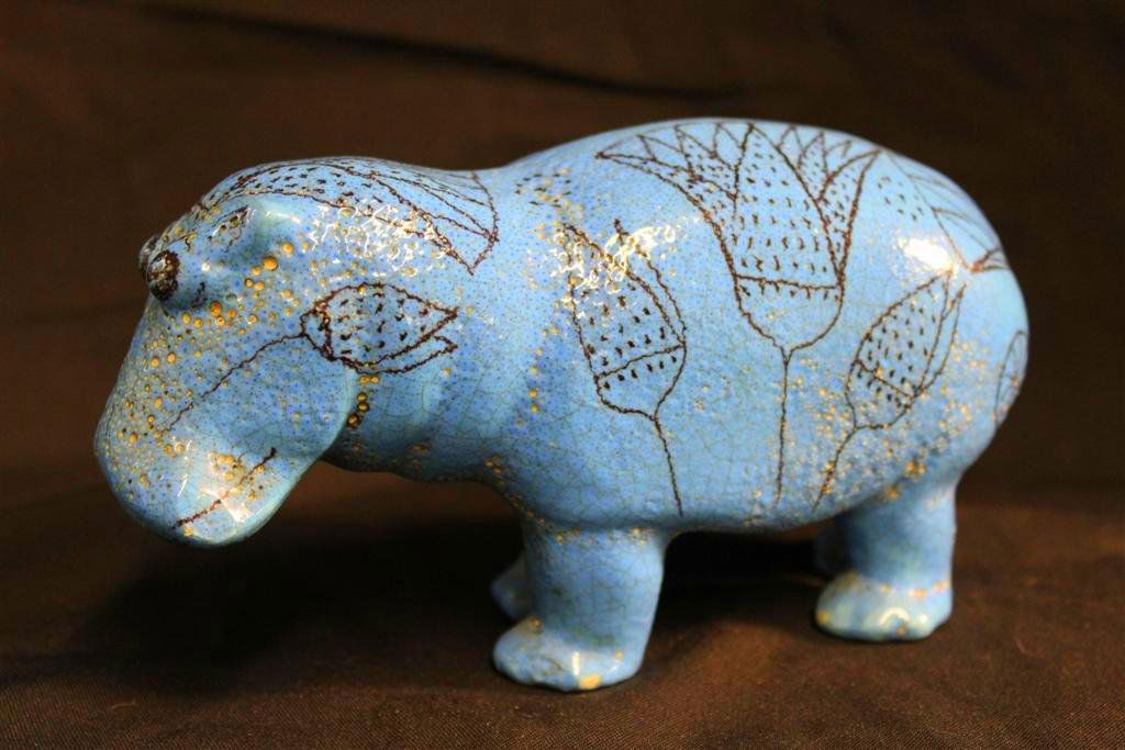 Italian Vintage Art Pottery Faience William the Hip: Vintage Art Pottery Faience Blue thick glazed hippo. Titled "William the Hippo" Made in Italy for the MMA to replicate the large Egyptian sculpture of the same name. Beautiful bright blue glaze with h