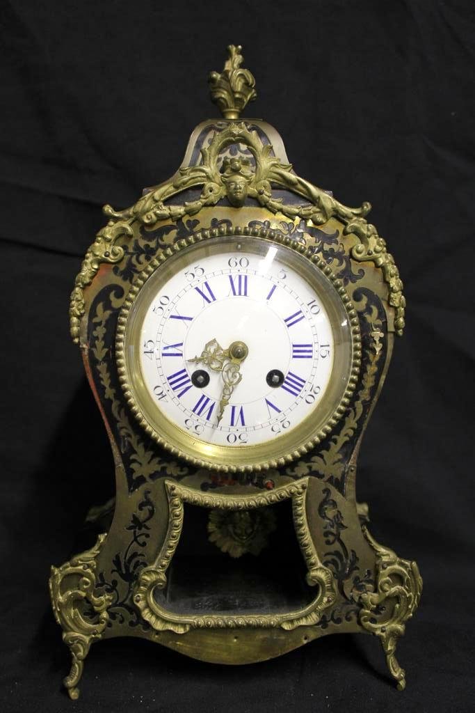 Louis Xv French Japy Freres Tortoise Inlaid Clock: A stunning example of an antique French Louis Xv period Mantel Clock. Ormolu mounted with ornate scrolls and foliage. Has fine cut brass mounted on the face and top with old original Tortoise shell in