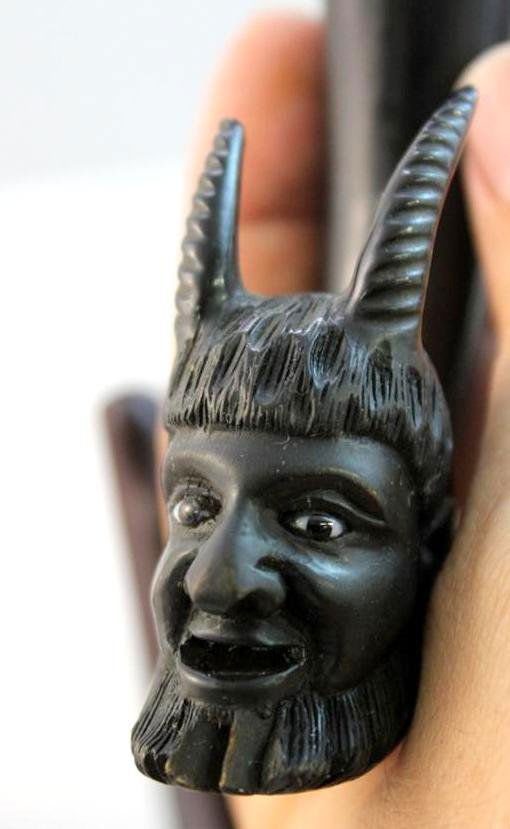 Carved Horn Devil Glass Eye Wood Pipe: A fantastic & RARE hand carved Black Horn wood pipe. Carved in the figural form of a mans head with Horns & glass eyes. Possibly representing the devil. Measures 5-1/2" by 3" by 1".
