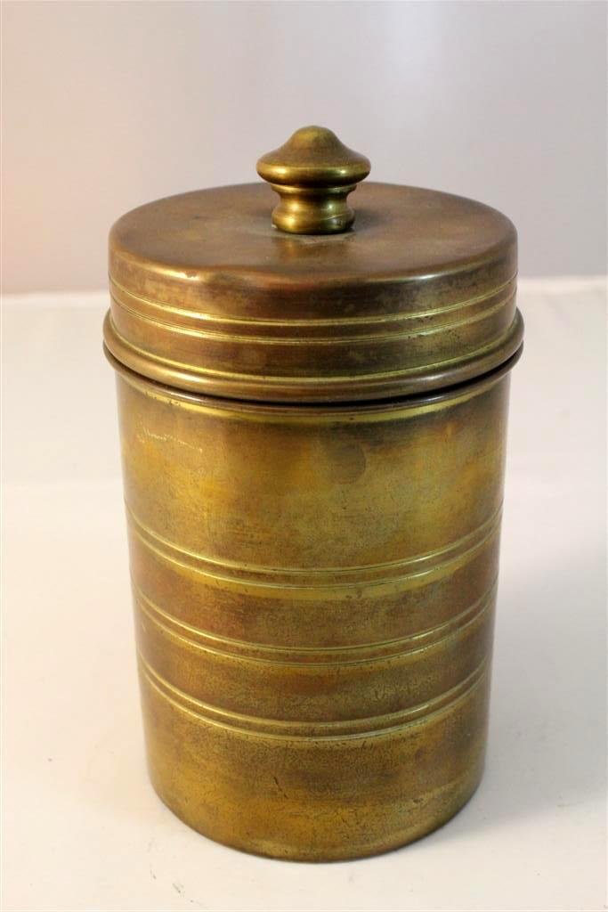 Bradley & Hubbard Brass Tobacco Humidor: A nice antique Art Deco period striped design Brass Tobacco Humidor made by the Bradley & Hubbard company. 6” by 3”.