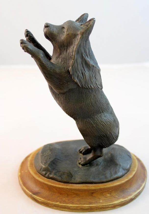 Ed Mitchell Little Captain Bronze Dog Sculpture: a limited edition Bronze scilpture by Ed Mitchell “Little Captain” A dog figurine dated 1-15-87 limited edition 15 of only 30 made. Foundry mark of AJA in a triangle. Mounted on wood base. Measure