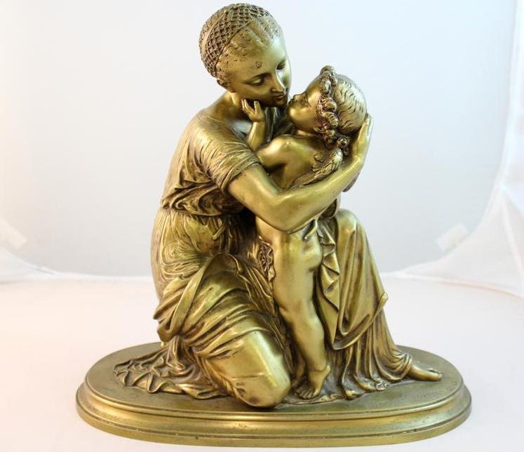 Mathurin Moreau Gilt Bronze Woman Cherub: A fantastic very high quality cast Gilt Bronze statue figure. Made by Matherin Moreau. Believed to be called love's Embrace or Kiss. A Neo Classical design woman kneeling embracing a cherub or putti a