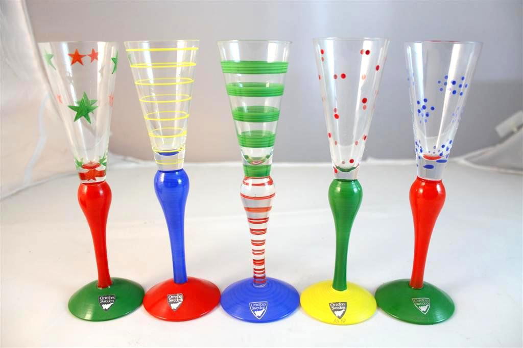Orrefors Anne Nilsson Clown Schnapps Glass: set of 5 hand painted Orrefors glass Schnapps glasses Designed by Anne Nilsson. Signed by the artist & labeled by Orrefors. Retired pattern called Clown. Measure 7” tall.