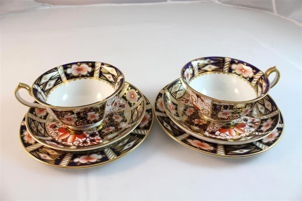 Royal Crown Derby Imari Cup Saucers Plates: Beautiful antique Royal Crown derby Porcelain Cups, saucers and plates. Set of two. Six pieces in all. All int pattern number 2451 Imari pattern heavy painted decoration.