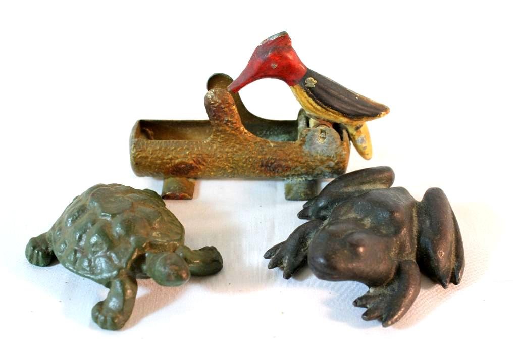 Antique Cast Iron Frog & Turtle Metal Woodpecker H: a set of three antique metal animal pieces. A cast iron black frog paperweight, a cast iron green painted turtle paperweight and a great metal painted woodpecker spring loaded toothpick holder. frog i