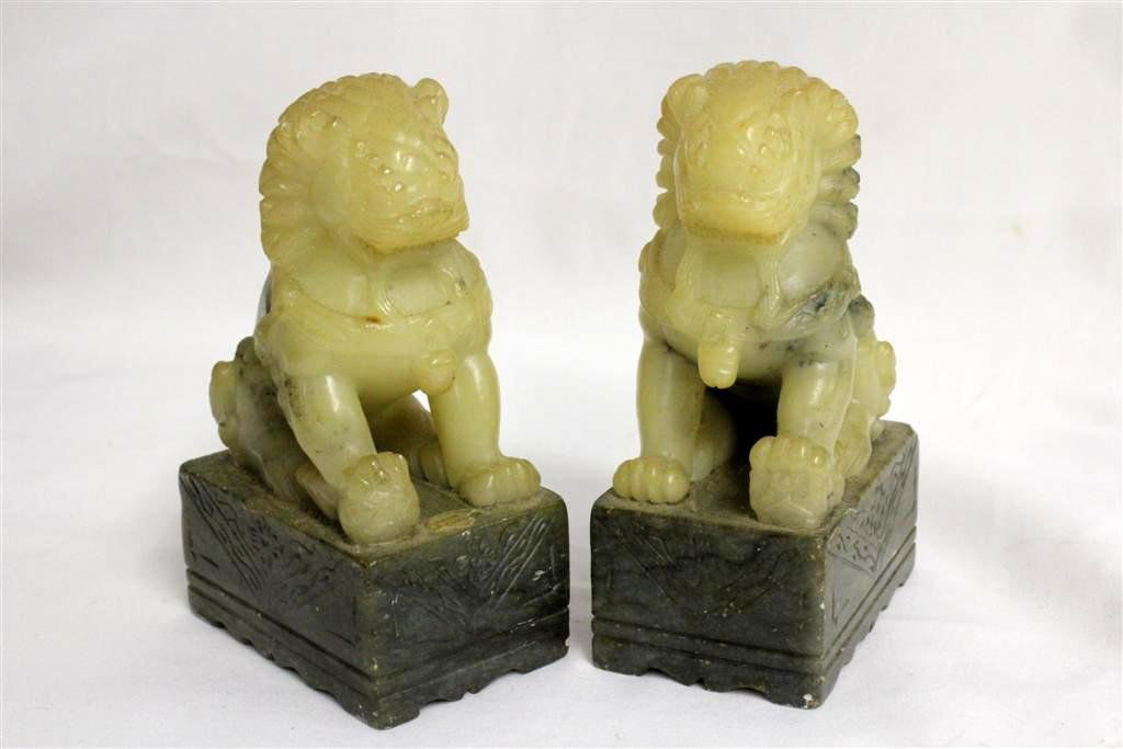 Vintage Chinese Alabaster Carved Fu Dogs Statues sculpt: Wonderful vintage carved alabaster stone Fu Dog sculptures. Made in China Circa mid century. Beautiful forms on grey stone bases. Marked with original paper label on one of the under the dog. Measurin