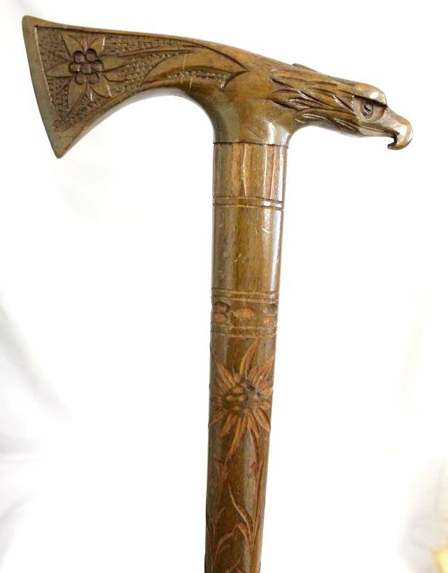 Native American Style Wooden Eagle Hatchet Walking Stic: This is a wonderful vintage Native American style Folk Art Hand Carved Walking Stick or cane. Carved with a beautiful eagles head on the handle with a hatchet on the backside of the eagle. The shaft i
