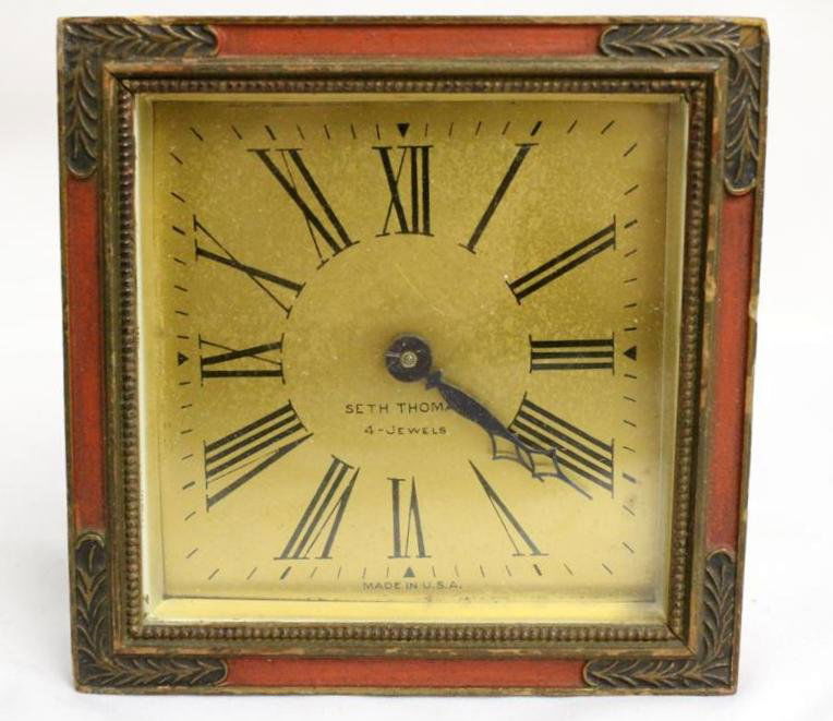 Vintage Art Deco Seth Thomas 4 Jewel Deck Clock: Nice vintage art deco period 1920's-40's Seth Thomas american made clock. A desk or side table clock with a brass face & red & gold surround. Mechanical 4 jewel Movement. Measures 5” by 5”. In wor