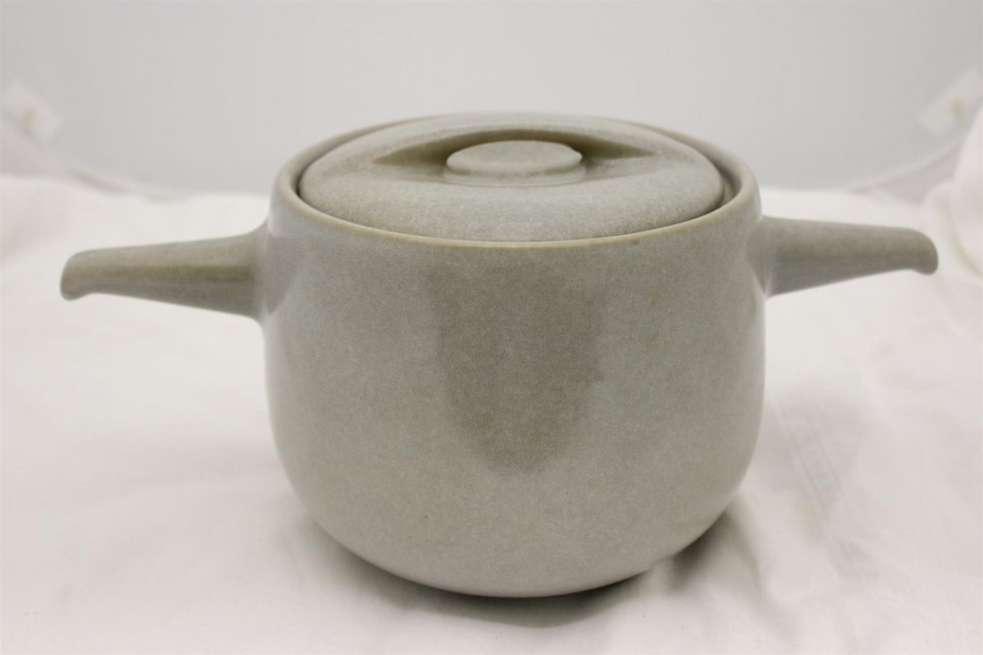 Mid Century Roseville Pottery Raymor Water Pitcher: Great Roseville Raymor Art Pottery Ice Lip Pitcher. Signed on the bottom. Covered in a Gray glaze. 7” tall