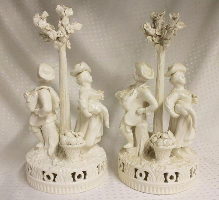 Vintage Italian Blanc De Chine Porcelain Figures Animal: Nice pair of matched vintage Italian Figures. Most likely made in Capodimonte. Male & Female Farm figures mounted on reticulated base with dog & basket of fruit. Tall tree with flowers atop. All hand