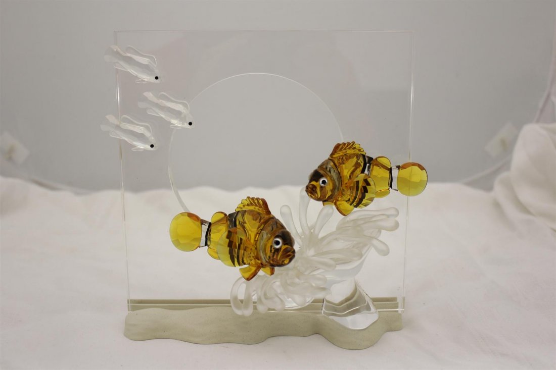 Large Swarovski Wonders of The Sea Harmony Crystal Fish: Beautiful Large Swarovski Crystal Multi-colored crystal sculpture. One of the Wonders of the sea pieces. This one titled Harmony. With orange colored Clown fish. Comes with white base. Signed. 7-1/2��