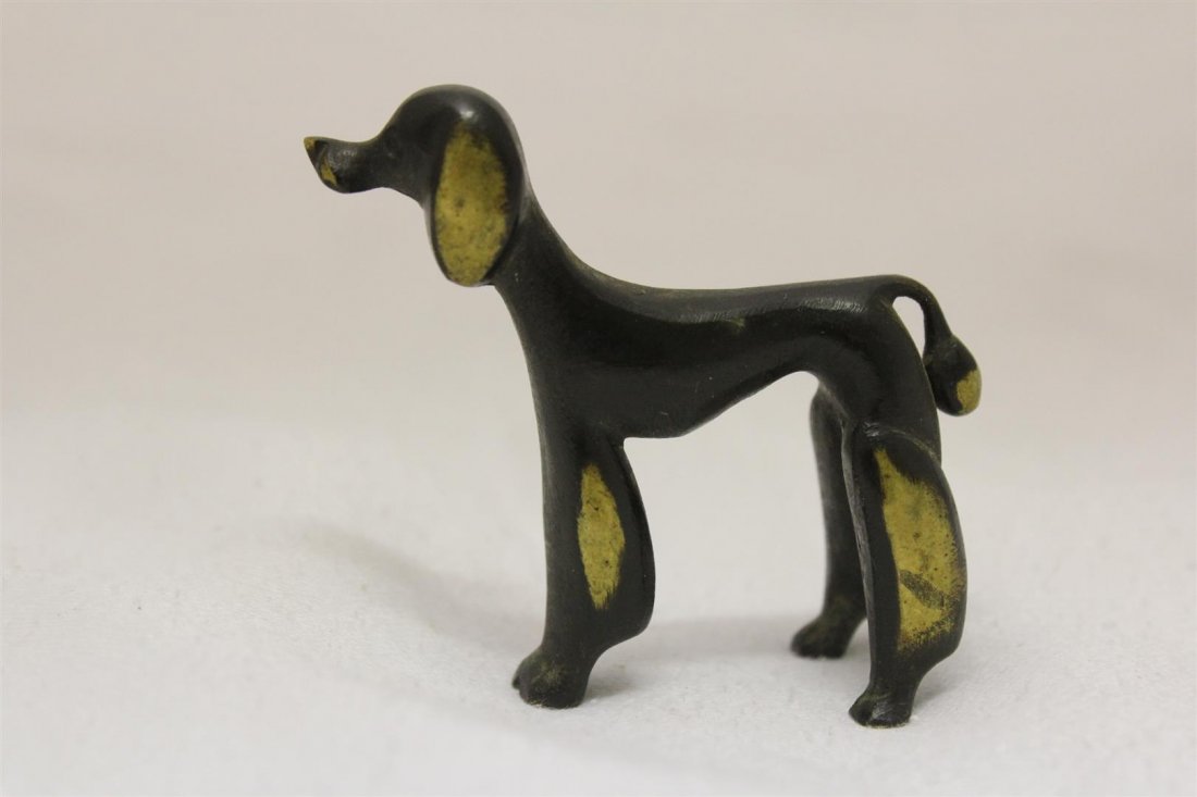 Richard Rohac Attributed Vienna Bronze Black Poodle: Very fine vintage Vienna Bronze Poodle Figurine. Marked on the foot Austria. Attributed to Richard Rohac. Partially polished Bronze and black finish. 1-3/4” tall