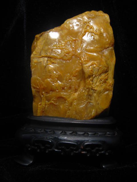 A Chinese Yellow Soapstone Carving: A Chinese Yellow Soapstone Carving depicting landscape and figures , size: 8 X 5.5 X 2 CM without stand