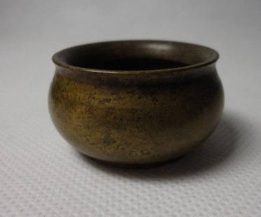 An Antique Bronze Censer: An Antique Bronze Censer ,marked , Qing Dynasty , size: 4.4 X 2.4 CM ,weight : 103 g