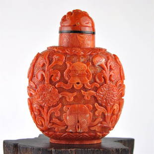 A Red Coral Carved Snuff Bottle: A Red Coral Carved Snuff Bottle ,Republic Period , size: 10 X 7.5 X 4.3 CM ,weight : 160 g