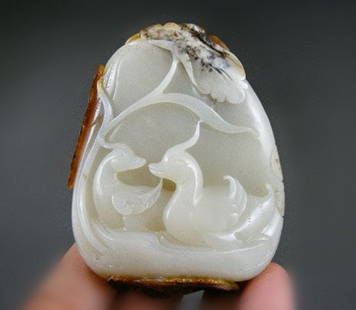 An Old White Jade Carving: An Old White Jade Carving with Mandarin ducks motif ,Late Qing Period , size: 7.8 X 6.3 X 2.8 CM ,weight : 156 g