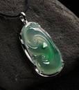 A 18K Diamond Jadeite Ruyi Pendant