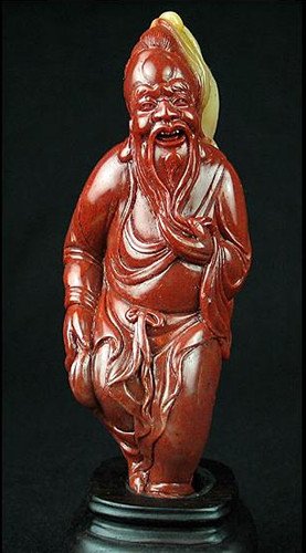 A Rare Red Soapstone Carving: A Rare Red Soapstone Fisherman Carving , pre 1980 , size: 11 X 4.5 X 3 CM