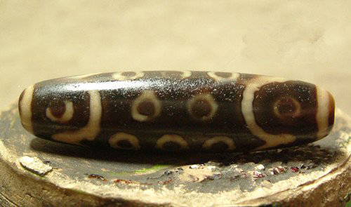 Old Tibetan Celestial Bead: Thousand - Year Old Tibetan Celestial Bead , 9 eyes ,size: 4.2 X 1.1 CM