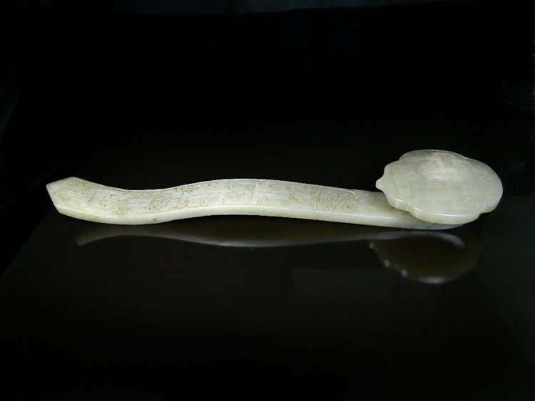 Old White Jade Ruyi Scepter: Old White Jade Ruyi Scepter ,Qing Period ,size: 33 X 3.5 CM , head size: 7.6 X 8.2 CM