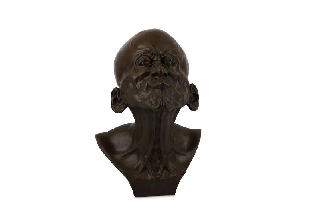 After Franz Xaver Messerschmidt - A bronze character: After Franz Xaver Messerschmidt - A bronze character head depicting a contorted face, a modern cast of one of Messerchmidt's series of sixty four canonical grimaces using himself as the model, signed