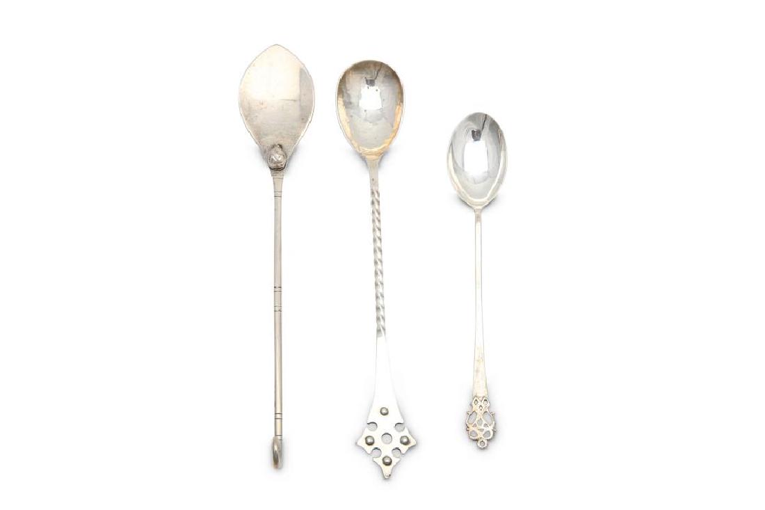 A mixed group of three sterling serving spoons (1 of 1)