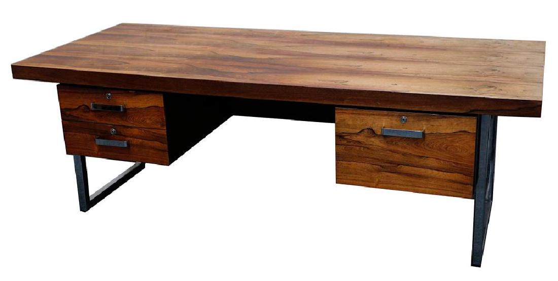 Trevor Chinn and Ray Leigh at Gordon Russell for Merrow: Trevor Chinn and Ray Leigh at Gordon Russell for Merrow Associates - A rosewood ‘GR Series 1’ desk, circa 1970, with black vinyl clad body and chrome plated handles and supports, width 213cm x dep