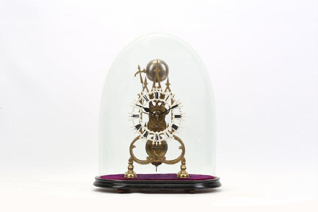 A 19TH CENTURY BRASS SKELETON CLOCK MODELLED ON: A 19TH CENTURY BRASS SKELETON CLOCK MODELLED ON LICHFIELD CATHEDRAL A 19TH CENTURY BRASS SKELETON CLOCK MODELLED ON LICHFIELD CATHEDRAL the frames with three spires over scrolling bases and raised on