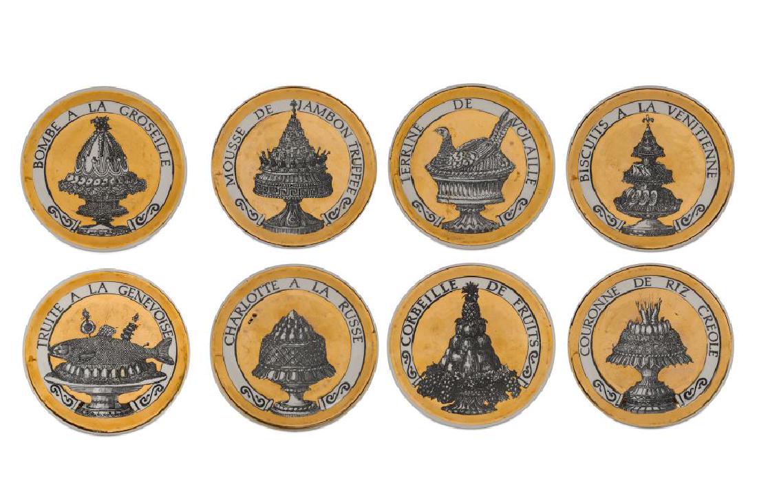 PIERO FORNASETTI (ITALIAN, 1913-1988), A COMPLETE SET: PIERO FORNASETTI (ITALIAN, 1913-1988), A COMPLETE SET OF EIGHT 'PRANZO ALLE OTTO' COASTERS, circa 1950-60, each printed in black with titled Italian culinary dishes against a gilt ground, in original