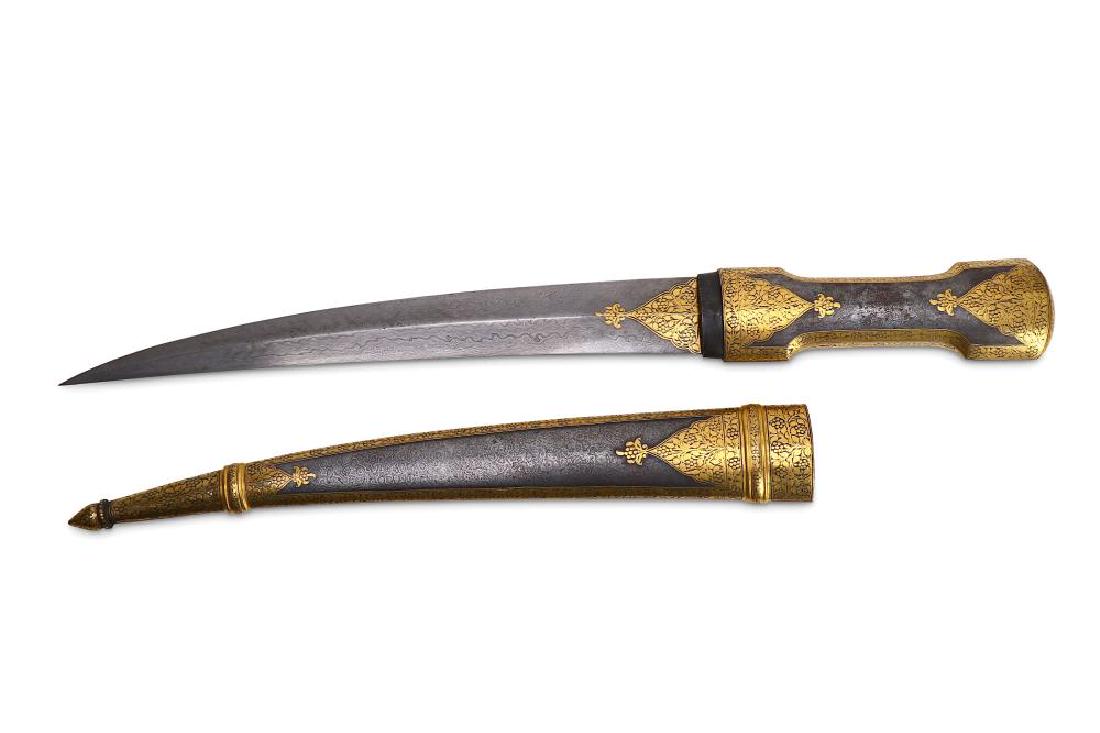 A GOLD-DAMASCENED WATERED-STEEL DAGGER (KHANJAR) Iran, (1 of 7)