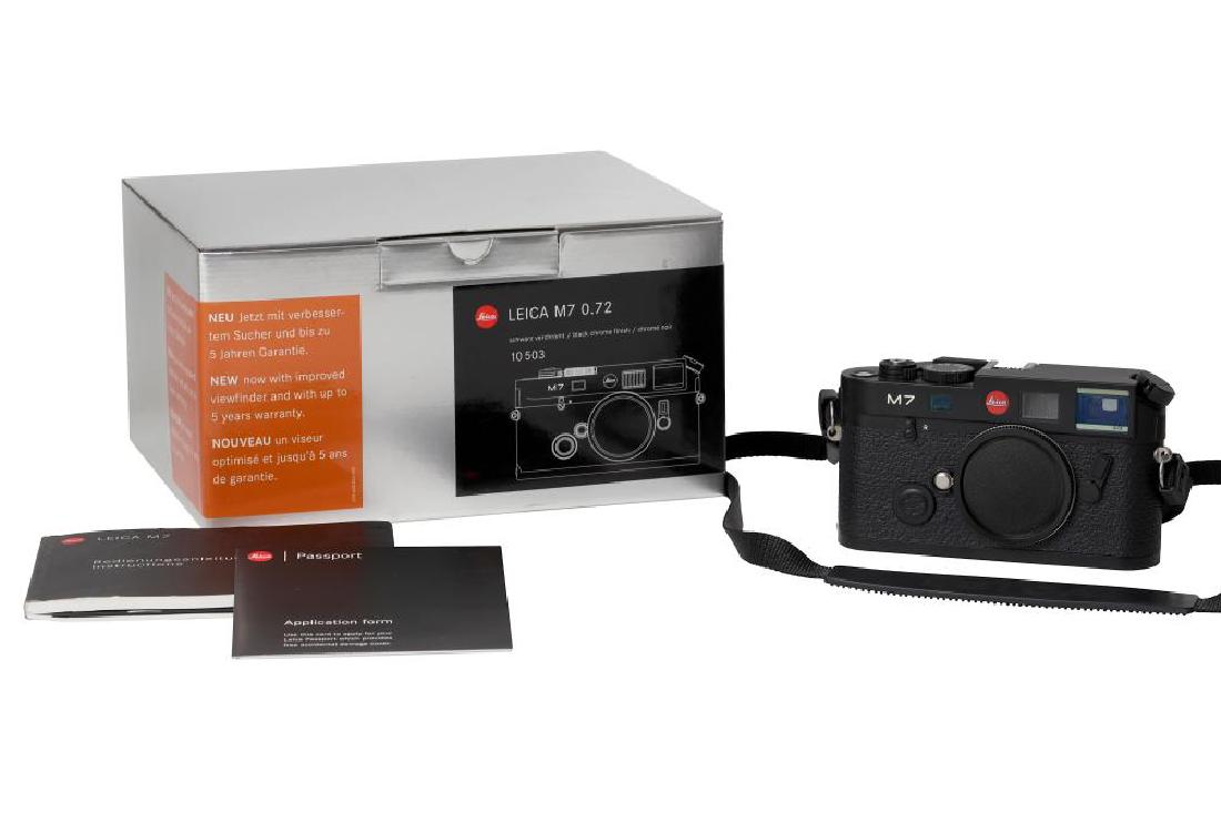 A Leica M7 0.72 Rangefinder Camera Body: A Leica M7 0.72 Rangefinder Camera Body Serial No: 2944147 (2003) Colour: Black Chrome Body: E Shutter: Working Notes: with matching numbers maker's box and paperwork, seemingly unused