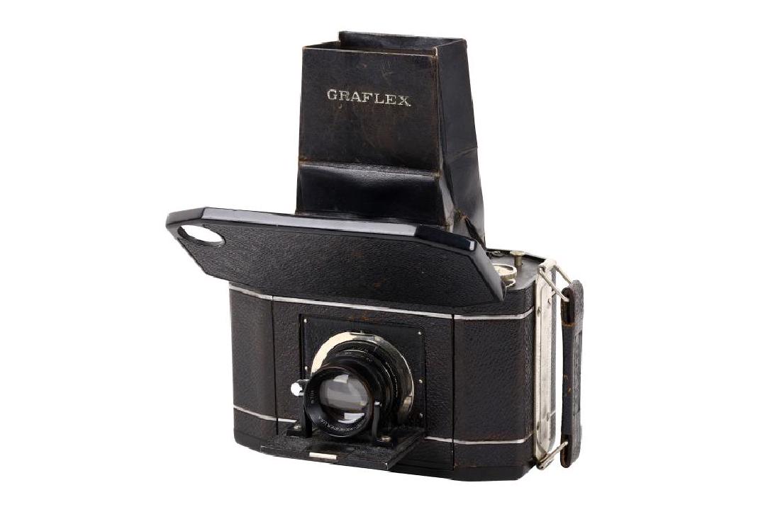 A National Graflex Series II SLR Camera: A National Graflex Series II SLR Camera Serial No: 206832 Body: G/VG Shutter: working Lens: B&Lf/3.5 Tessar, no. 9704 Optics: G