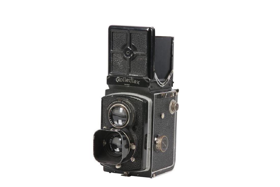 A Rolleiflex 6x6 Standard TLR Camera: A Rolleiflex 6x6 Standard TLR Camera Serial No: 513906 Date: 1932-1938 Body: G, Shutter: working Viewing Lens: Heidoscop Anastigmat 7.5cm f/3.1 no.513039 Taking Lens: Carl Zeiss Jena 7.5cm f/3.5 Tessa